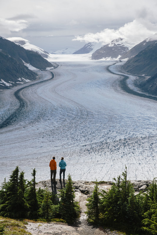 travellers viewing salmon glacier